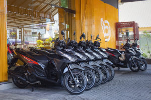 Motorcycle and scooter rental Bali fleet parked in lot