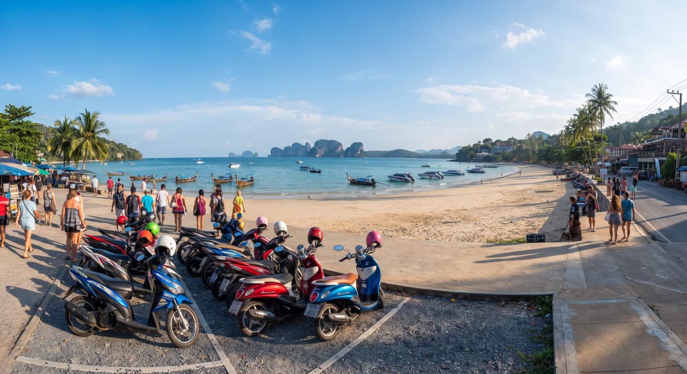 Ao Nang Beach — scooters parked along the beachfront promenade Ao Nang Beach — scooters parked along the beachfront promenade